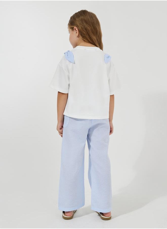 Styli Slogan Print Oversized T-Shirt & Striped Pants Set  - Image 4