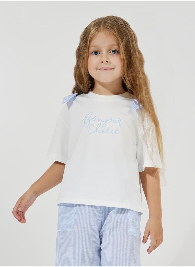 Styli Slogan Print Oversized T-Shirt & Striped Pants Set  - Image 2