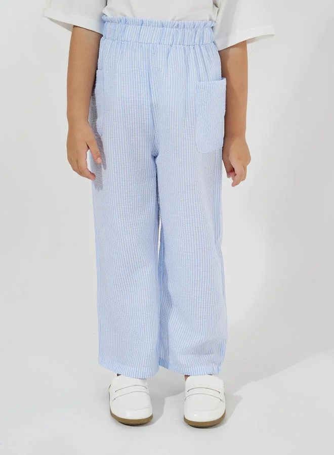 Styli Slogan Print Oversized T-Shirt & Striped Pants Set