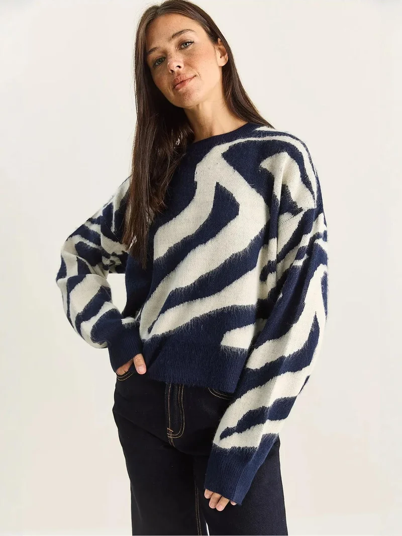 Bianco Lucci LUCCI Zebra Pattern Ribbed Knit Sweater