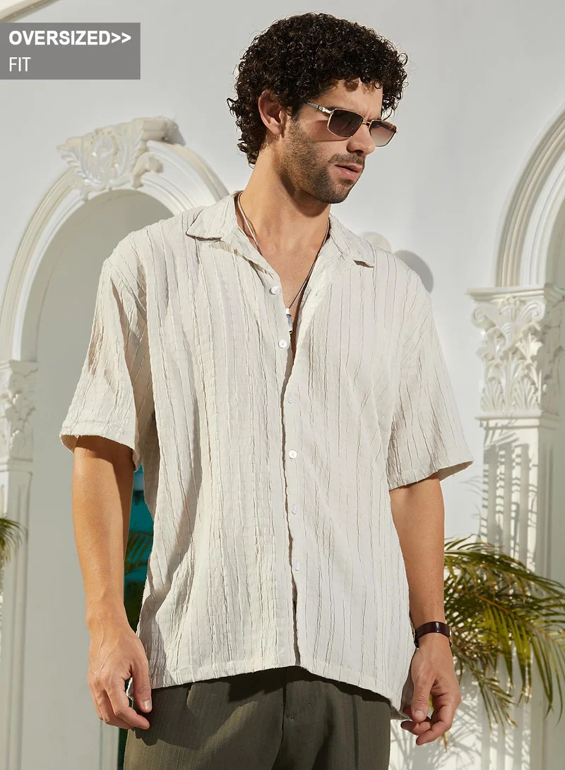 كامبوس سوترا Campus Sutra Men's Saltbox Beige Crumble-Revival Oversized Shirt For Casual Wear | Cuban Collar | Short Regular Sleeves | Button Closure | Oversized Shirt Crafted With Comfort Fit For Everyday Wear