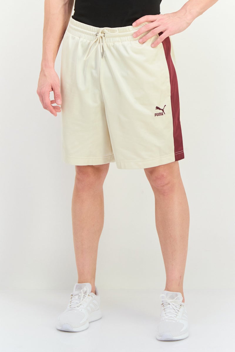 PUMA شورتات رياضية للرجال مناسبة في الهواء الطلق، كريمي/ماروني - Image 1