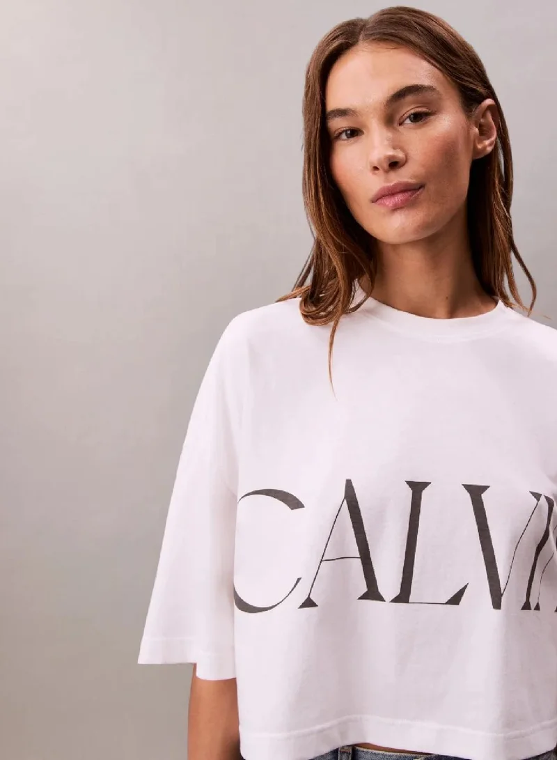Calvin Klein Jeans Brilliant White Cropped Graphic Logo T-Shirt for Women | Best Price UAE