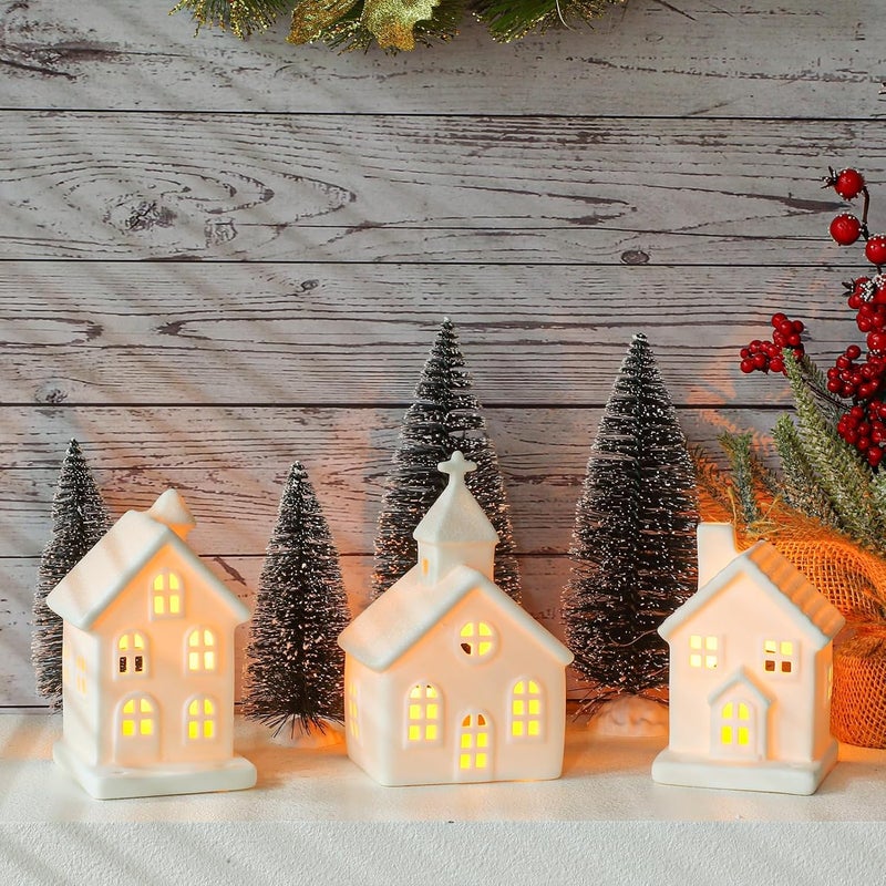 Peninpha 7PCS Christmas Village Sets - 3 LED Lighted Ceramic White Houses with 4 Decorative Christmas Trees Remote Control Led Candles for Xmas Home Tabletop Mantel Shelf Decor - Image 1