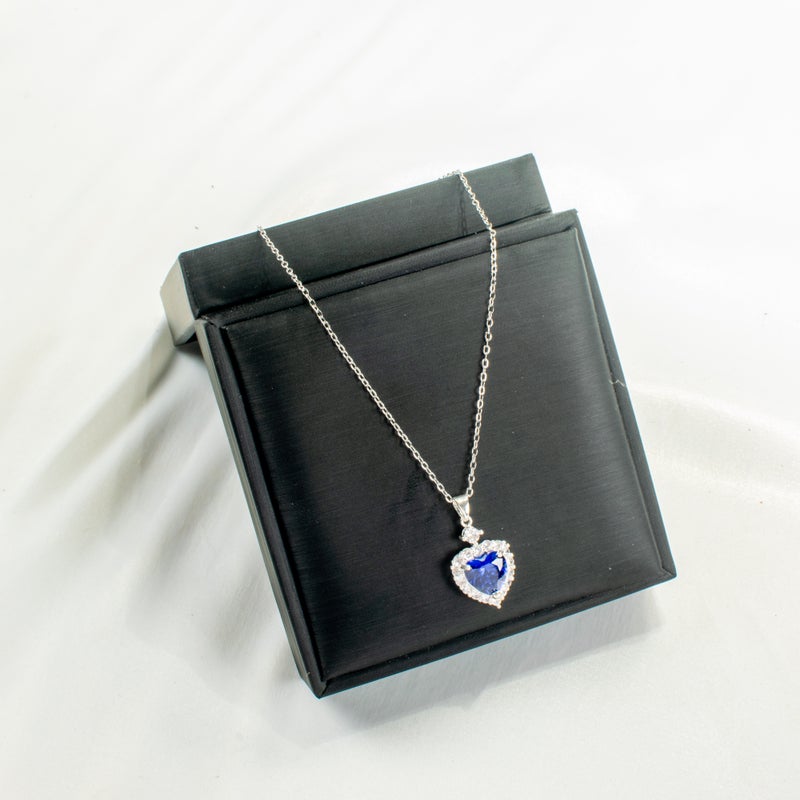 سلسلة أستانليس ستيل فضي مع دلاية شكل قلب أزرق مرصعة بفصوص الزيركون - Image 1