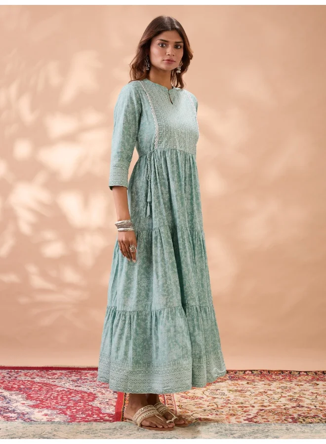 globus Women Green Mandarin Collar Floral Print Fit and Flare Lace & Tie Up Detail Flared Hem Tiered Maxi Dress