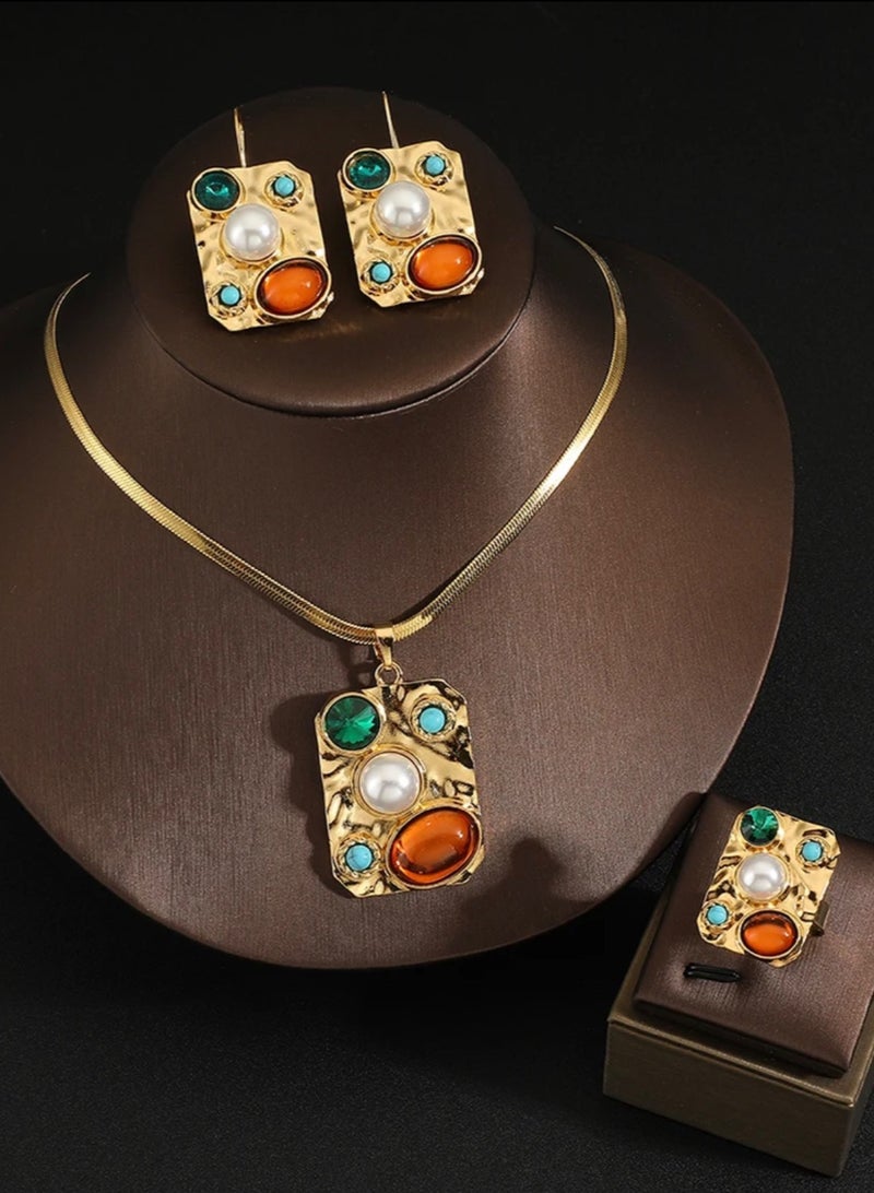 نيو ستايل طقم اكسسوارات نسائي فاخر مكون من سلسال وحلق أذن وخاتم من الاستانلس ستيل مطلي باللون الذهبي - Image 1