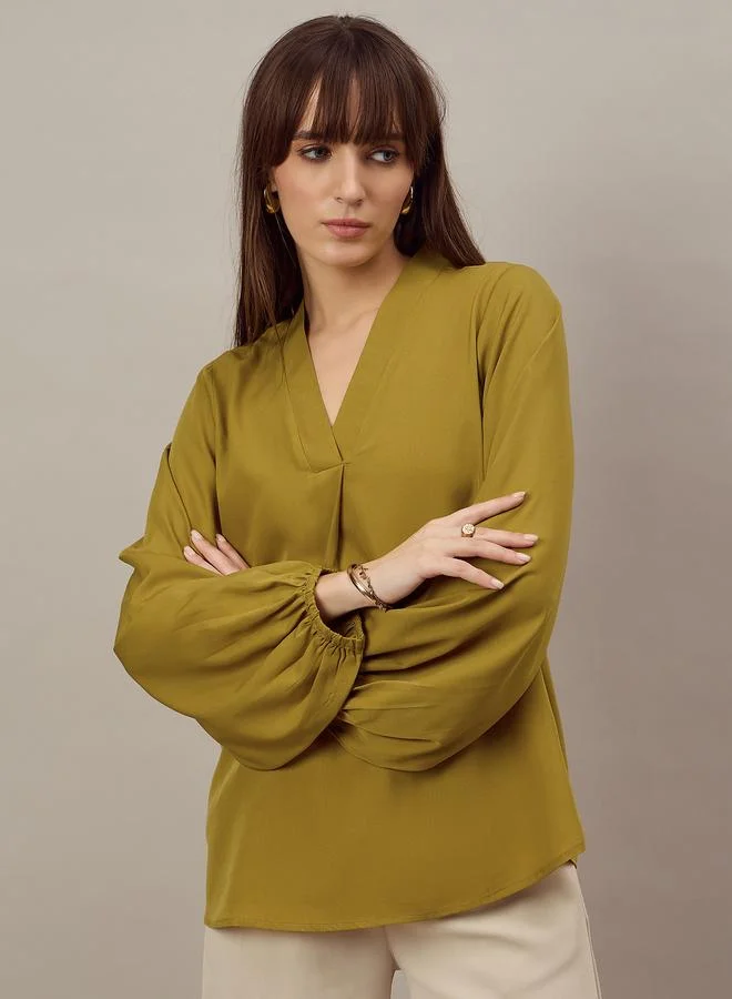 كواري بلوزة بأكمام طويلة بقصة مريحة