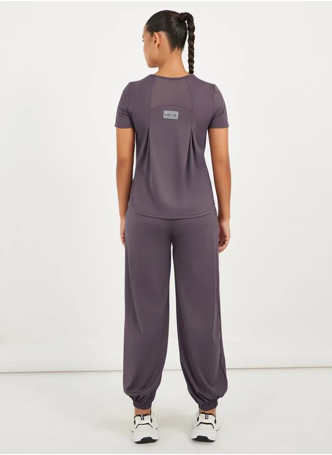 Styli Gymspire Edition - Label Text Print Mesh Insert Short Sleeve Top