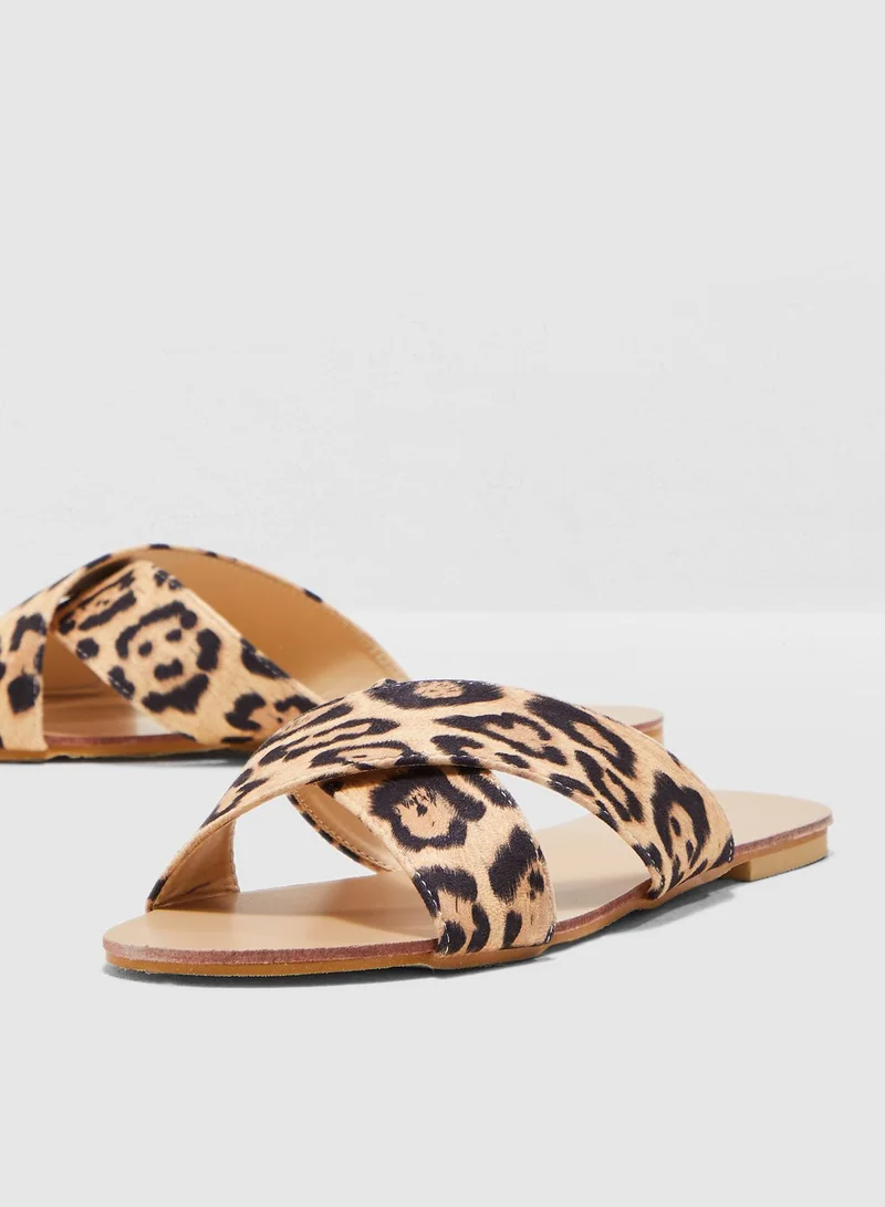 Ginger Cross Over Sandals In Leopard Print