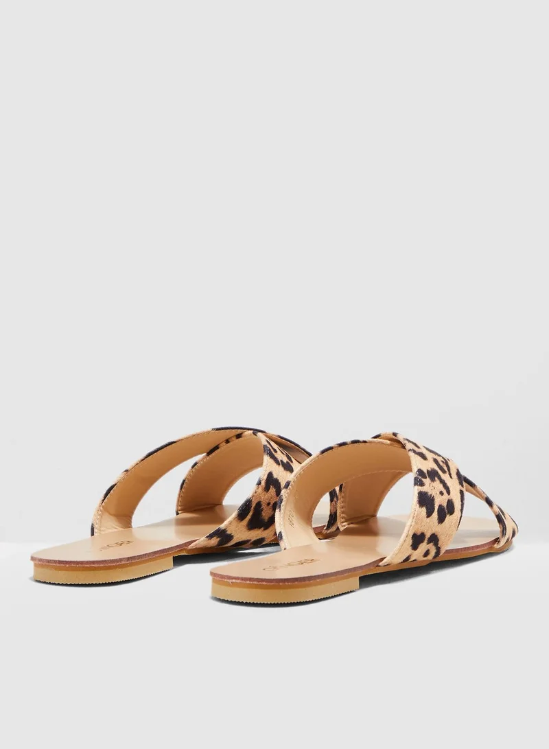 Ginger Cross Over Sandals In Leopard Print