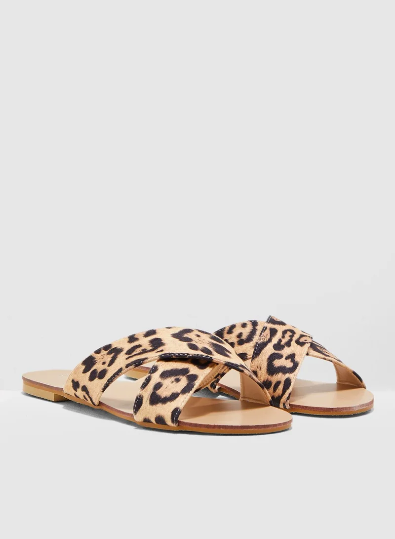 Ginger Cross Over Sandals In Leopard Print