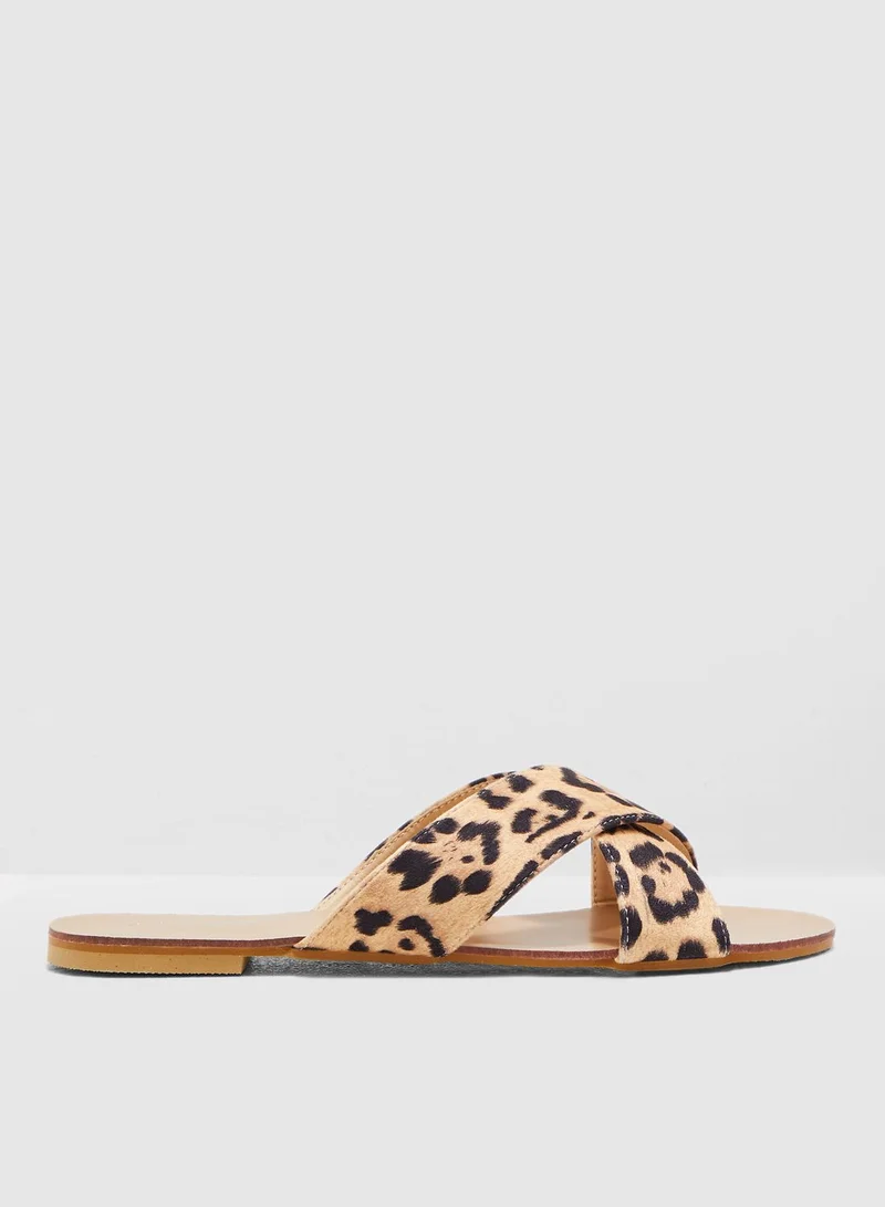 Ginger Cross Over Sandals In Leopard Print
