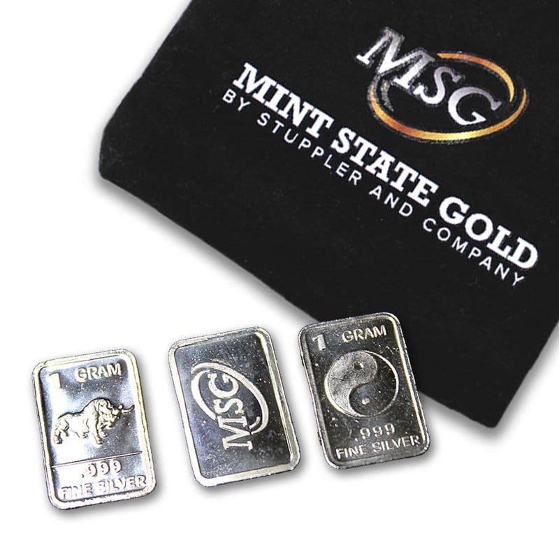 MINT STATE GOLD Three (3) One Gram .999 pure Silver Bars with random designs in a jewelry pouch - Image 1