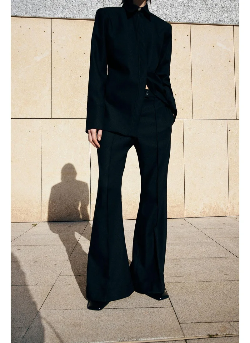 H&M Flared crease-leg trousers