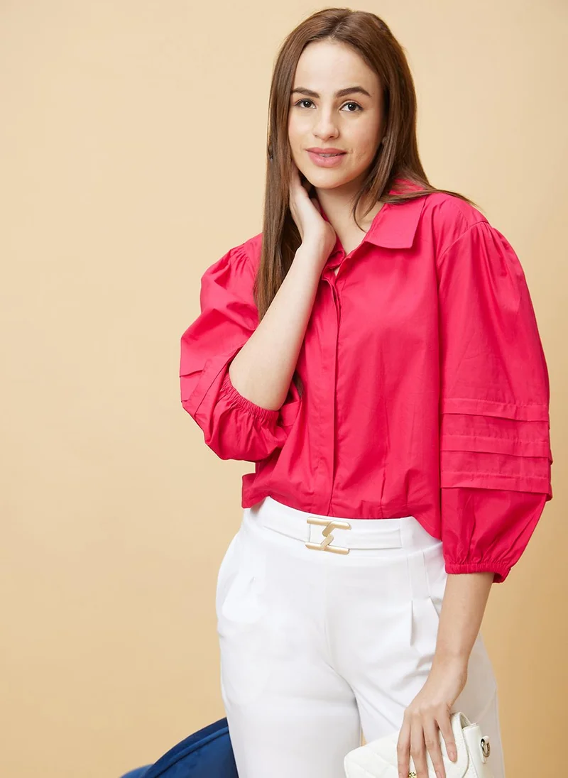 جلو باص قميص نسائي قطني بأكمام منفوشة وياقة قميص وردي