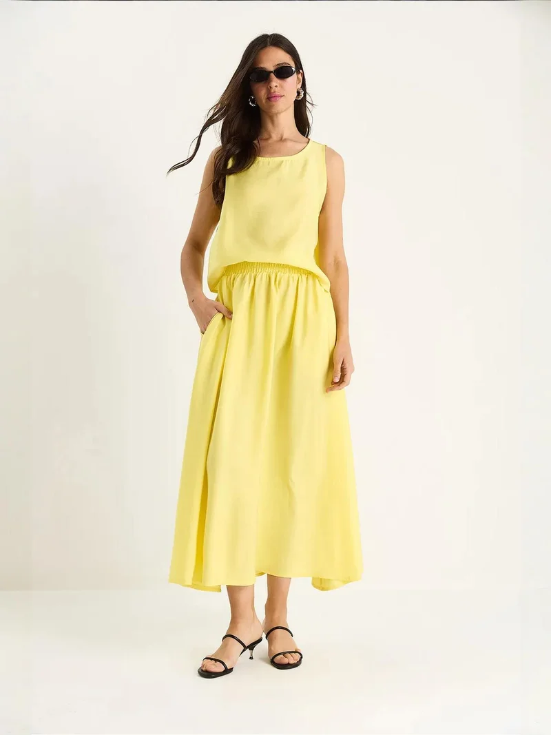 بيانكو لوتشي طقم تونيك طويل بدون أكمام بياقة دائرية وسروال واسع الساق من لوكسي