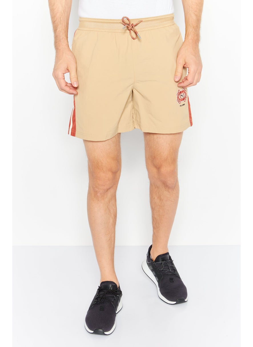 Puma x Palomo Men Athletic Fit T7 Drawstring Training Short, Tan  - Image 1