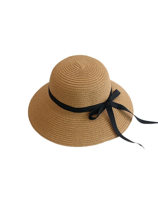 Sunshade straw hat with black ribbon bow  - Image 1