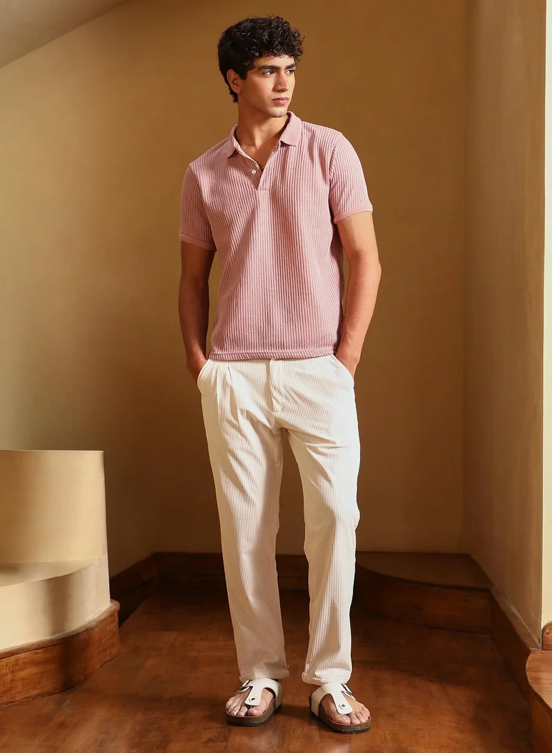 Campus Sutra Men Solid Ribbed Polo T-Shirt | Jacquard Polo Neck , Short Jacquard Cuff Sleeves | Half-Button Closure Straight Hem | Solid Jacquard | Knitted Fabric For Casual & Daily Wear | Blush Pink