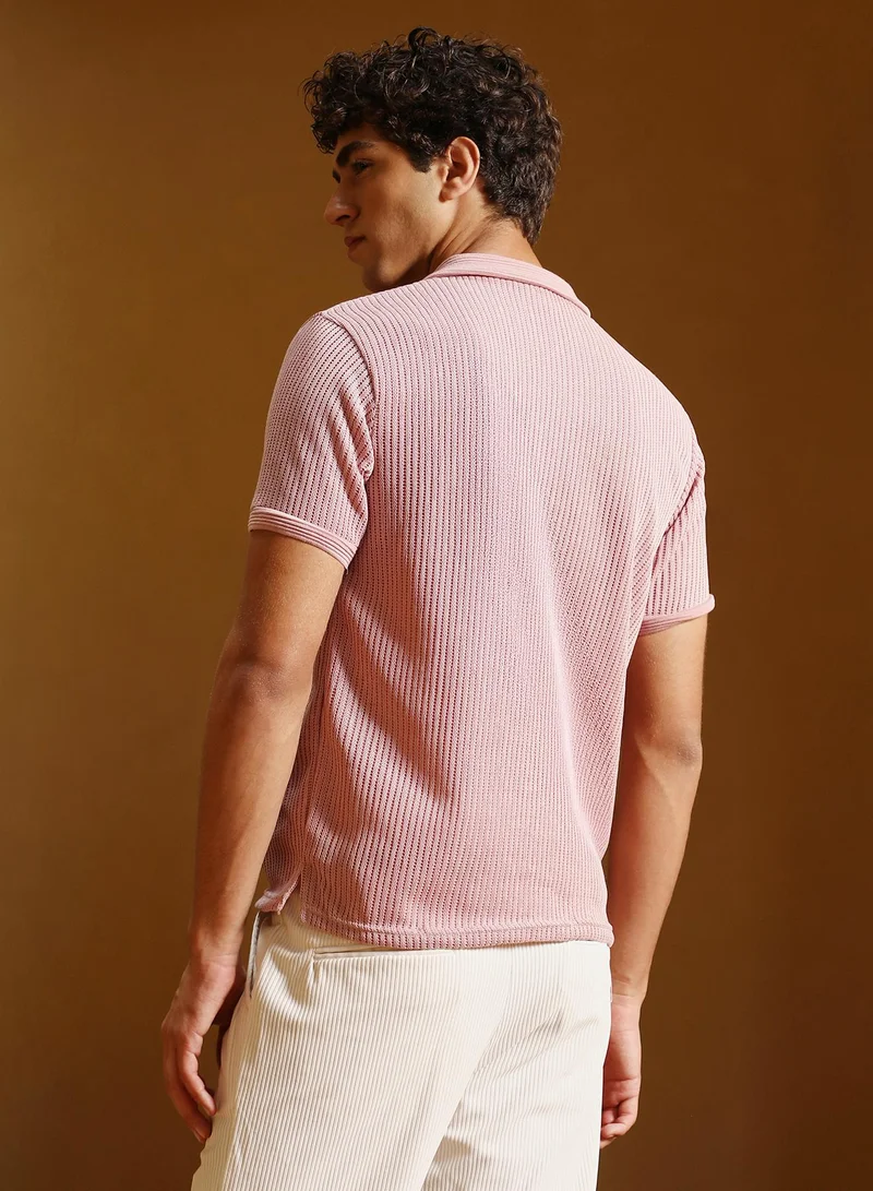 Campus Sutra Men Solid Ribbed Polo T-Shirt | Jacquard Polo Neck , Short Jacquard Cuff Sleeves | Half-Button Closure Straight Hem | Solid Jacquard | Knitted Fabric For Casual & Daily Wear | Blush Pink