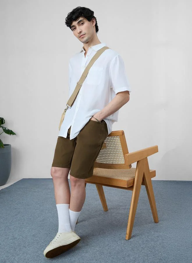 ذا سوليد ستور شورت دنيم سادة بطول الركبة