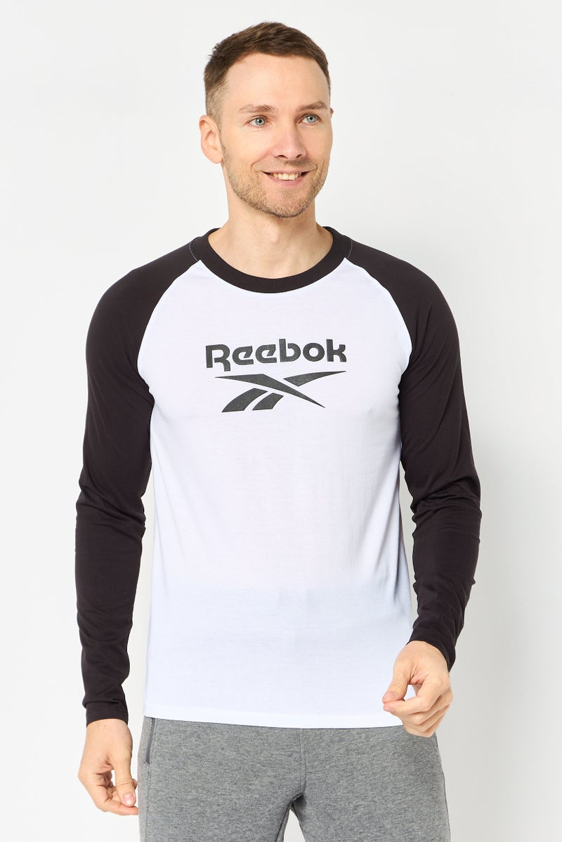 Reebok تي شيرت رياضي للرجال بأكمام طويلة مناسب للخارج، متعدد الألوان - Image 1