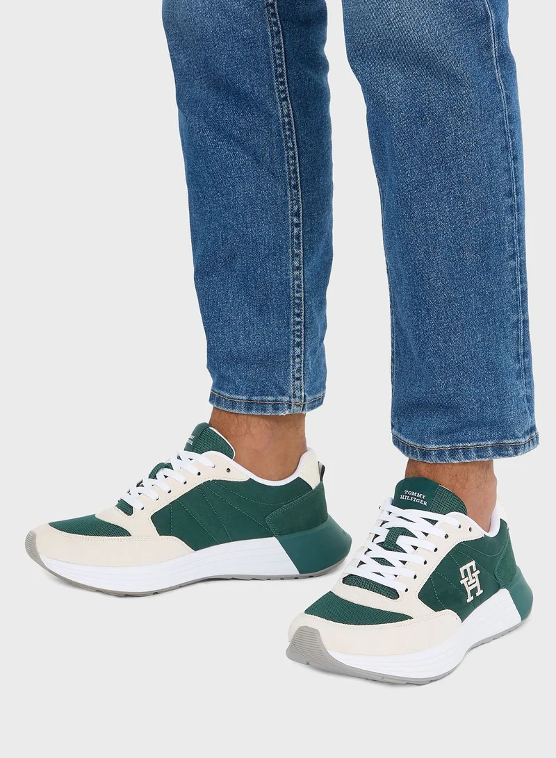 تومي هيلفيغر سنيكرز إليفادت رانر برقبة منخفضة