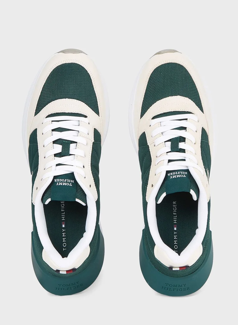 تومي هيلفيغر سنيكرز إليفادت رانر برقبة منخفضة