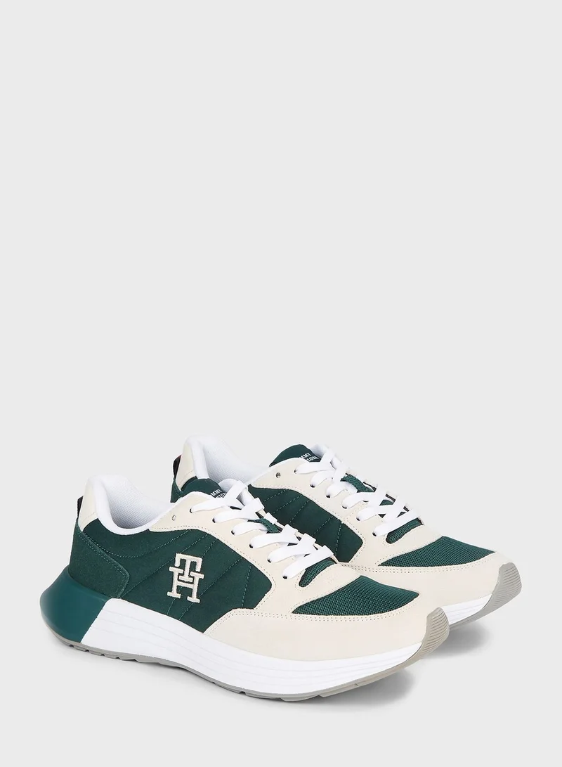 تومي هيلفيغر سنيكرز إليفادت رانر برقبة منخفضة