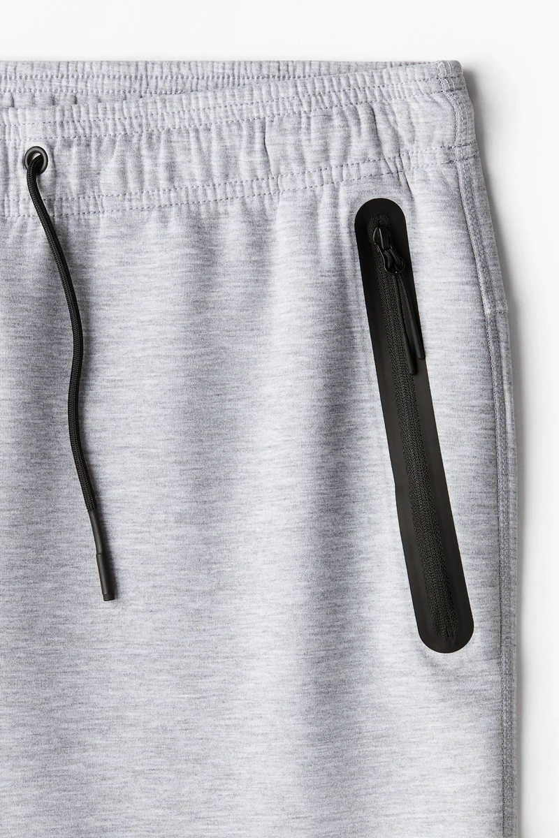 H&M  DryMove™ Tapered sports joggers for Men | Best Price UAE