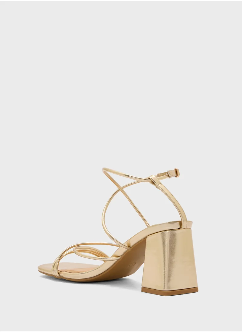ترافل من نمشي Flaire Block Heel Multi Strap Ankle Strap Block Heel Sandal