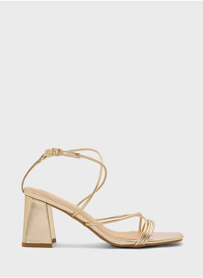 ترافل من نمشي Flaire Block Heel Multi Strap Ankle Strap Block Heel Sandal