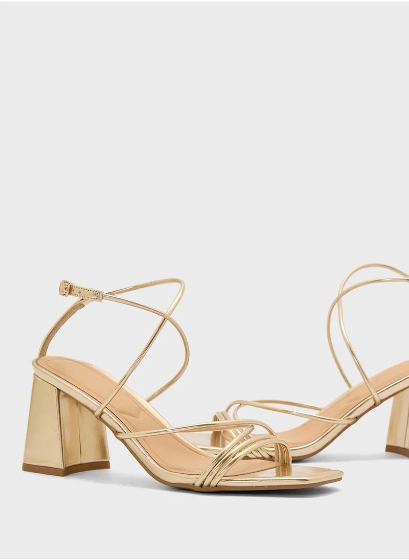 ترافل من نمشي Flaire Block Heel Multi Strap Ankle Strap Block Heel Sandal