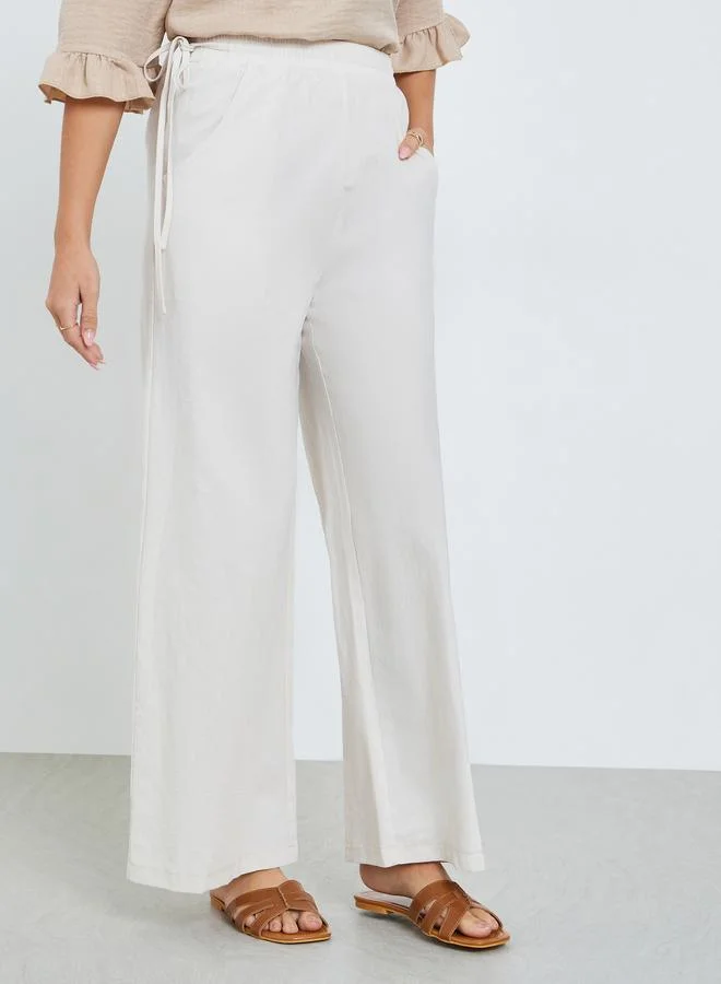 تايك تو بنطال بتفاصيل جيب ورباط سحب عند الخصر