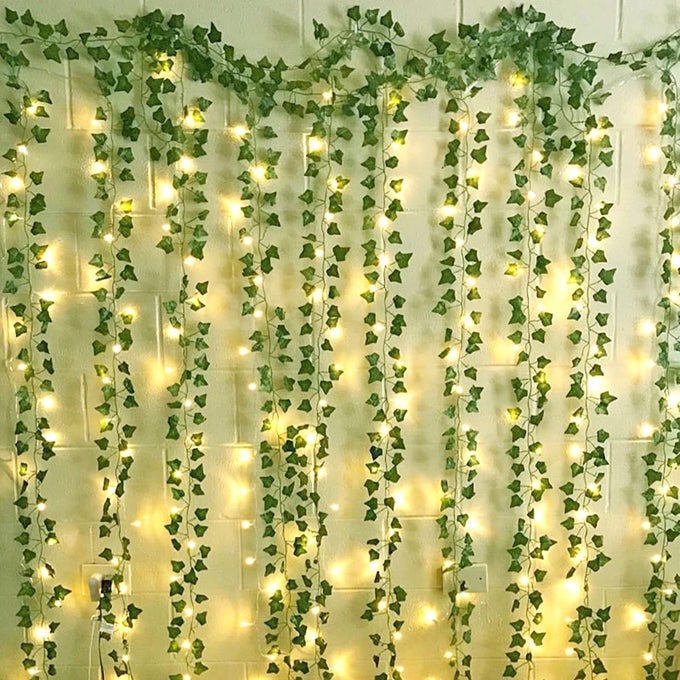 12 PACKS ARTIFICIAL IVY 84FT GARLAND HANGING PLANTS FAKE VINES WITH 200 LED STRING LIGHT FOR BEDROOM WEDDING PARTY GARDEN WALL ROOM HOME DECOR