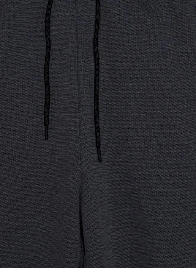 ماكسيم Men Relaxed Fit Cut and Sew Joggers with Drawstring Closure