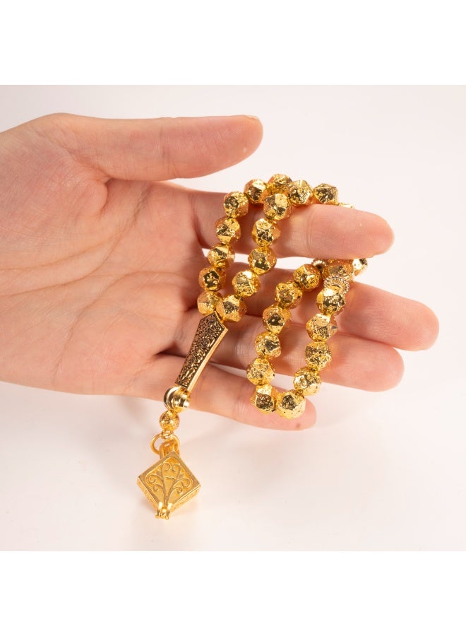 سبحة حجر بركاني بلون ذهبي 33 خرزة | سبحة حجر لافا مع قلادة مضيئة | تشطيب معدني أنيق | سبحة إسلامية للرجال - Image 1