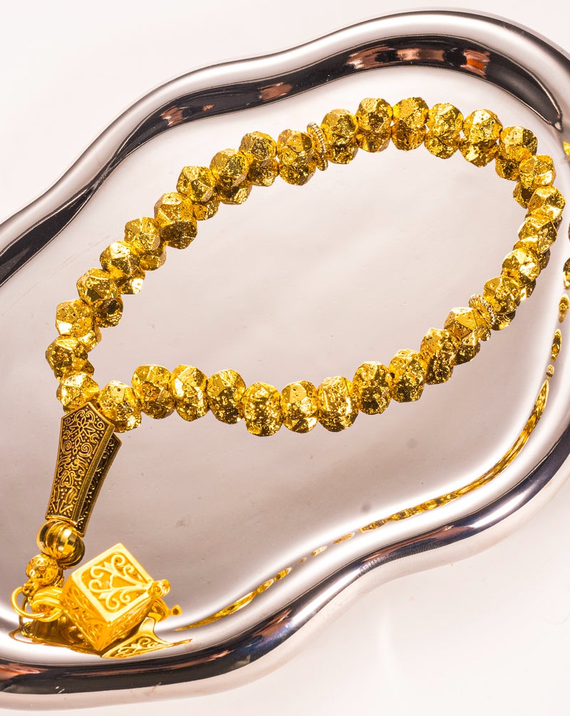 سبحة حجر بركاني بلون ذهبي 33 خرزة | سبحة حجر لافا مع قلادة مضيئة | تشطيب معدني أنيق | سبحة إسلامية للرجال - Image 2