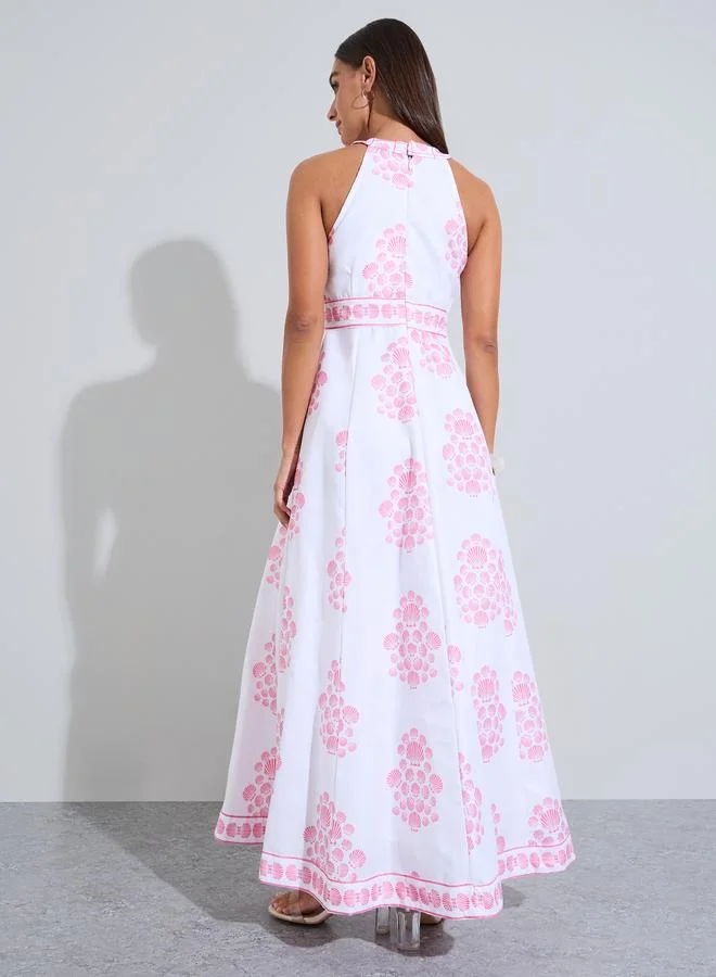 Styli  Pink All Over print Halter Neck A-Line Maxi Dress for Women | Best Price UAE