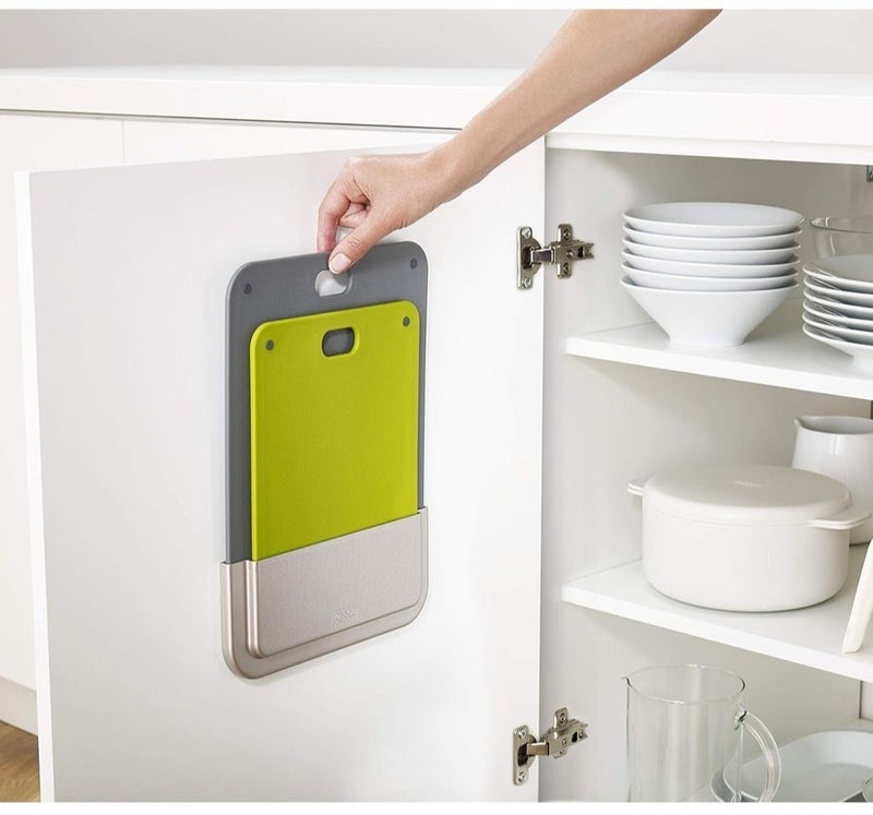 A flexible 2-piece chopping board set with a storage holder that mounts inside a kitchen cabinet; an organizer that saves space and is easy to install without tools. - Image 2