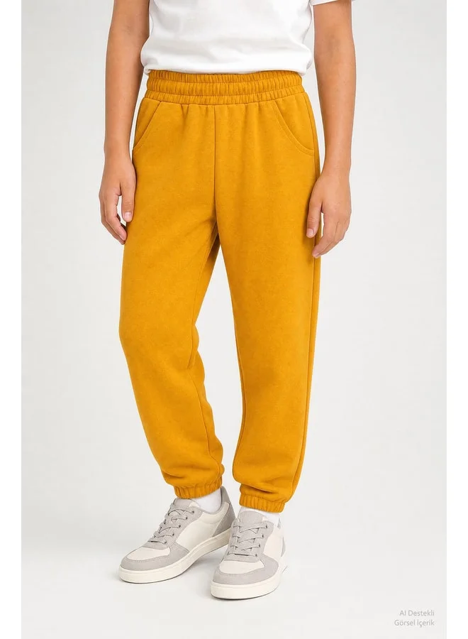 Perendi Elastic Comfortable Fit Pocketed Unisex Sweatpants for Boys and Girls.