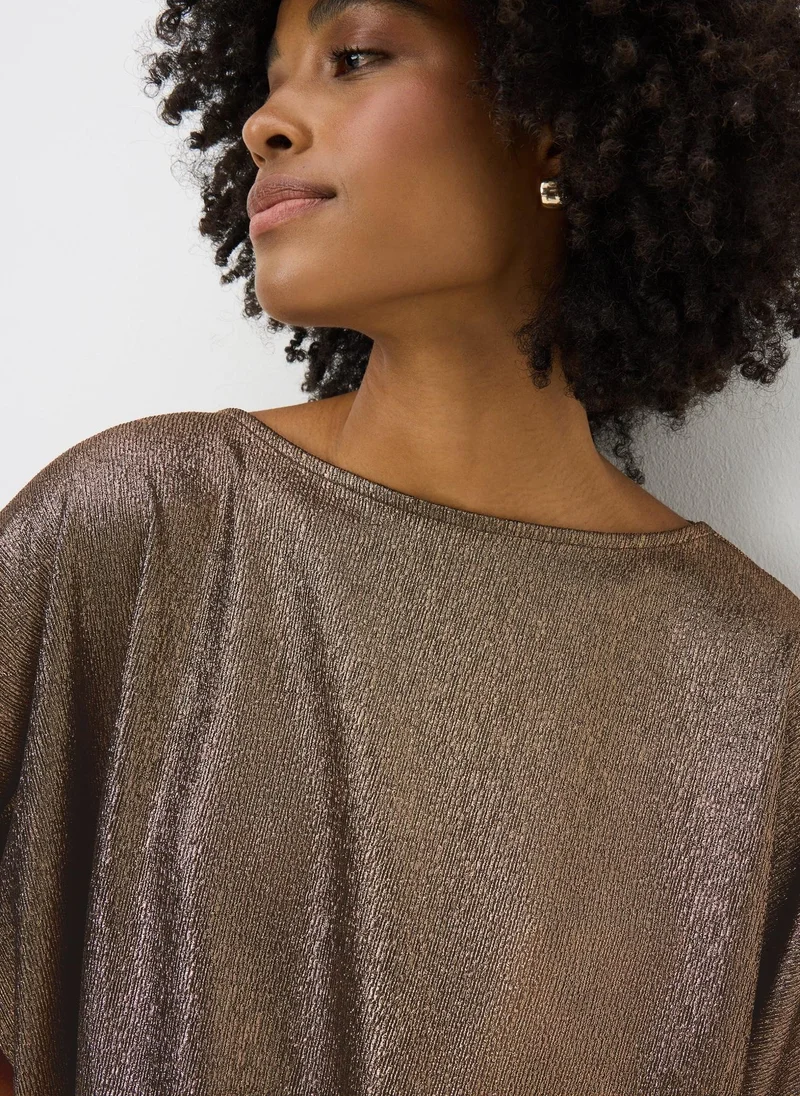 ماتلان بلوزة طويلة بلمسة برونزية