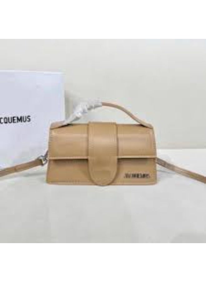 Jacquemus Le Bambino mini bag in a light beige or nude color