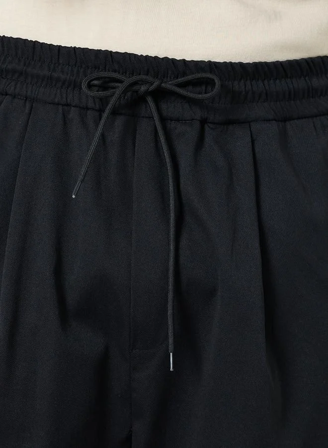 Styli Styli Solid Oversized Pleated Trousers with Drawstring