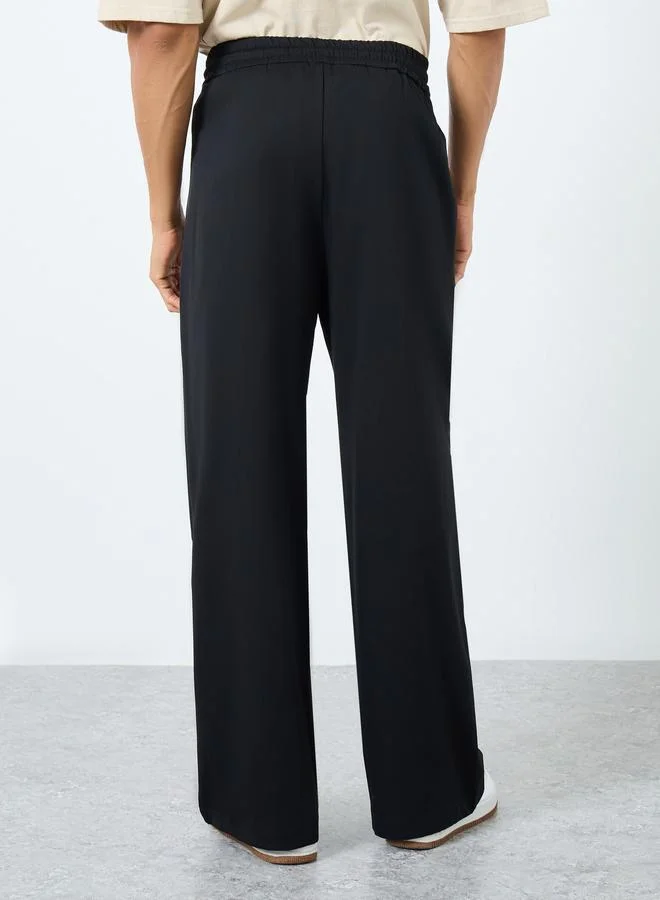 Styli Styli Solid Oversized Pleated Trousers with Drawstring
