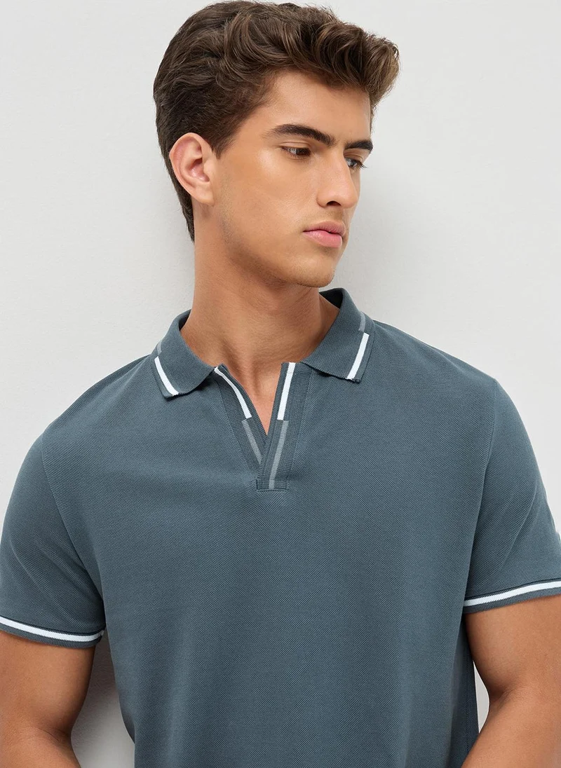 Urbano Fashion  Urbano Fashion Men's Dark Grey Solid Regular Fit Half Sleeve Cotton Polo T-Shirt for Men | Best Price UAE