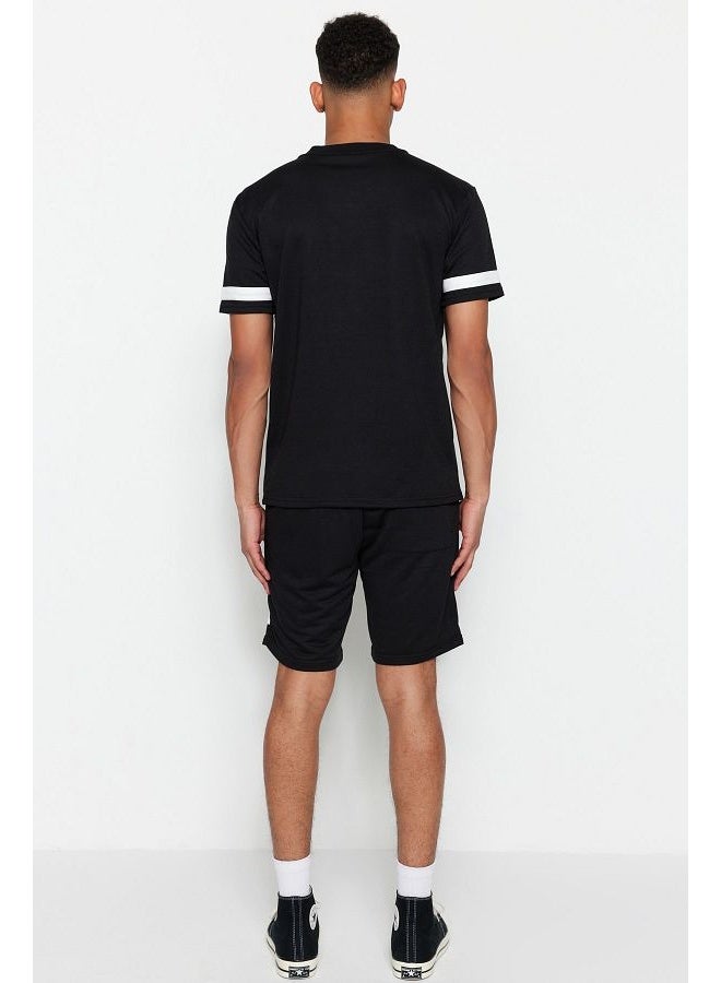 trendyol Black Tracksuit Set Regular Cut Embroidered Contrast Paneled T-Shirt/Shorts TMNSS21EM0077  - Image 1
