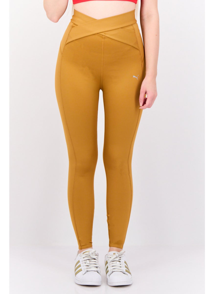 PUMA Women Sportswear Fit Brand Logo Outdoor Leggings, Tan  - Image 1