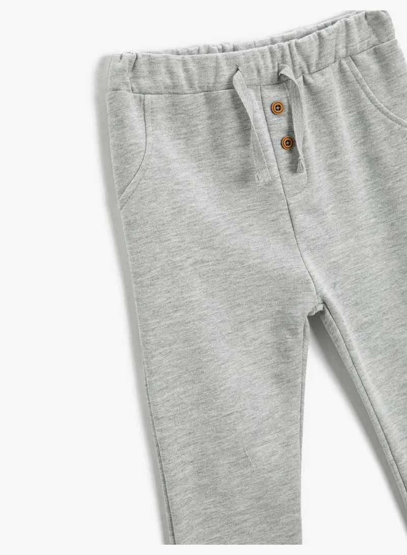 KOTON Basic Sweatpants Pockets Button Detail Elastic Waistband